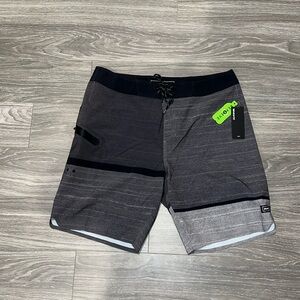 Dakine pavones board shorts. Size 34. NWT